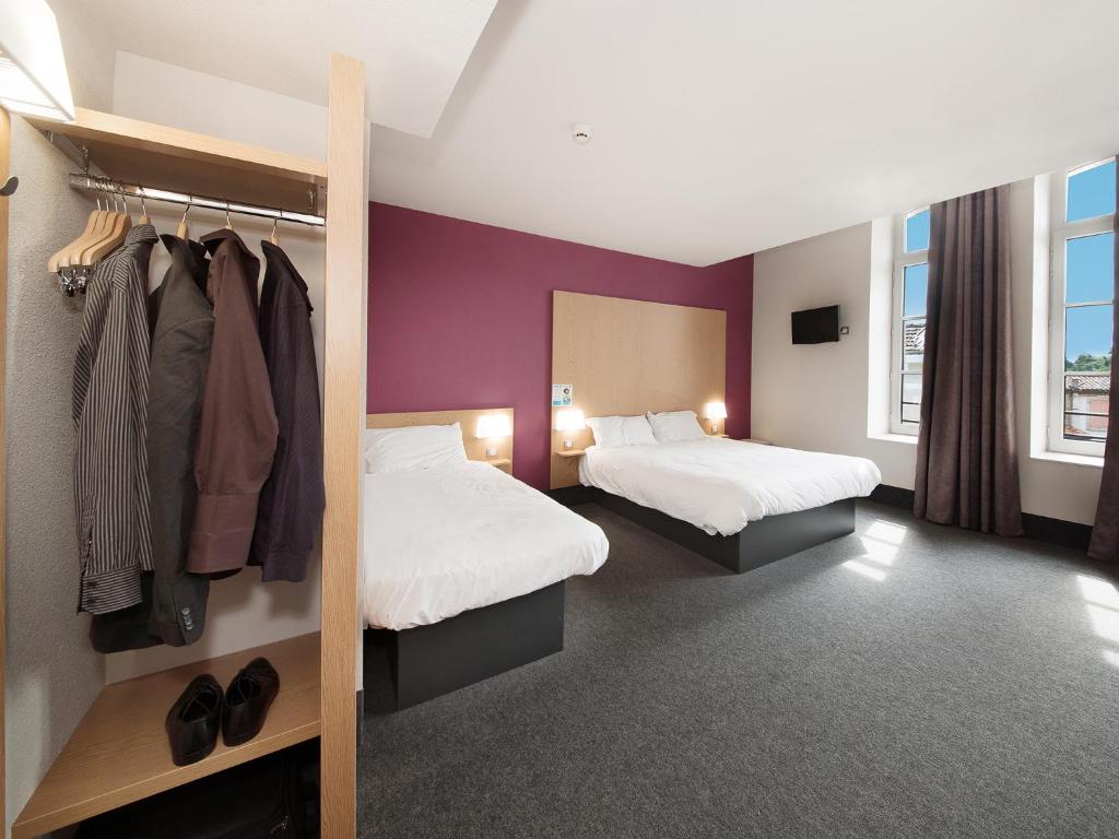 Postel nebo postele na pokoji v ubytování B&B HOTEL Castres Centre Gambetta