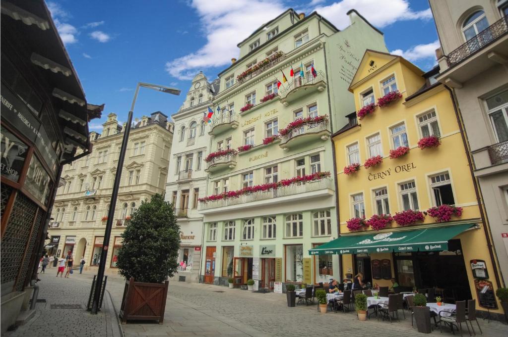 a street in a city with buildings at Spa Hotel Purkyně in Karlovy Vary