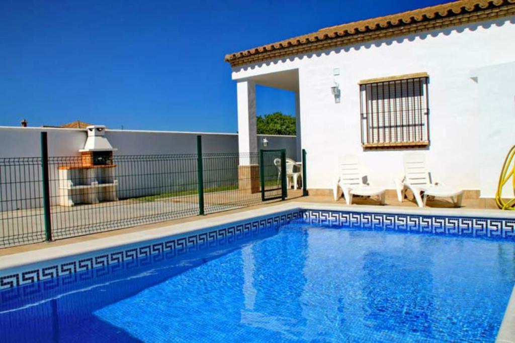 The swimming pool at or close to Chalet Arroyo Peñuelas 41