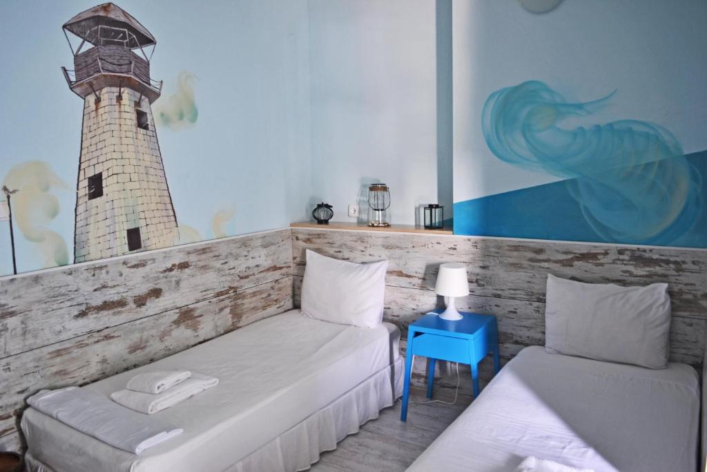 A bed or beds in a room at Art Hotel Simona