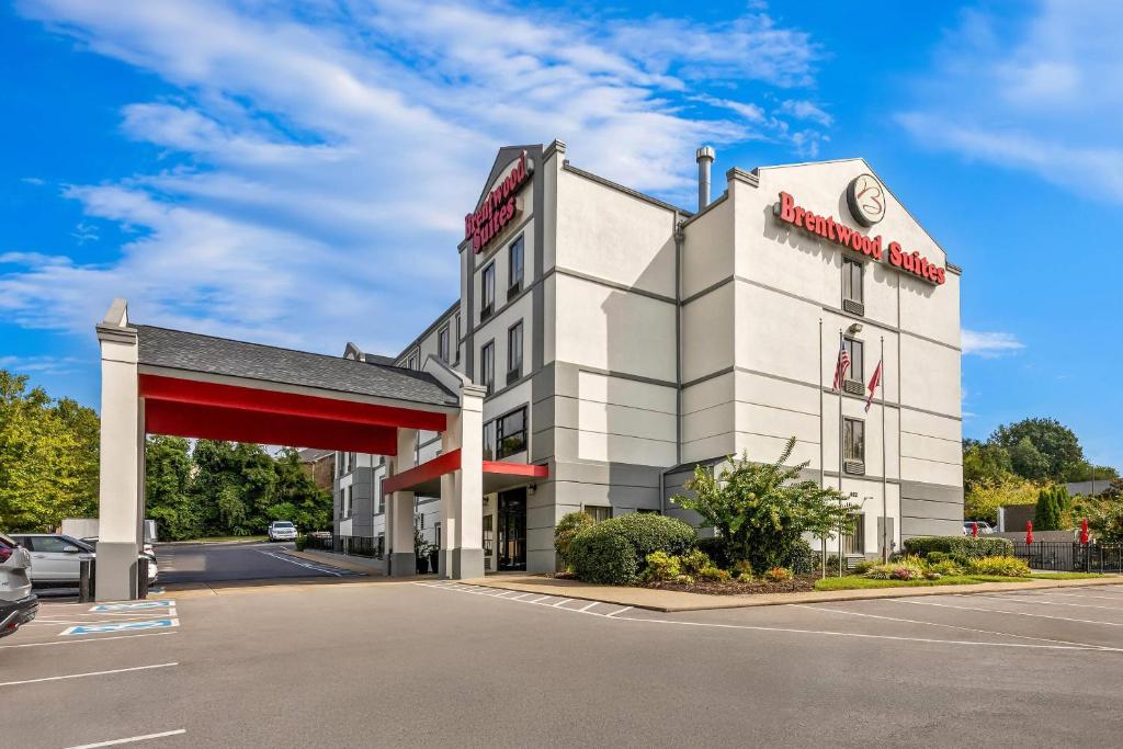 a rendering of a hotel with a gas station at Brentwood Suites Nashville, an Ascend Collection Hotel in Brentwood