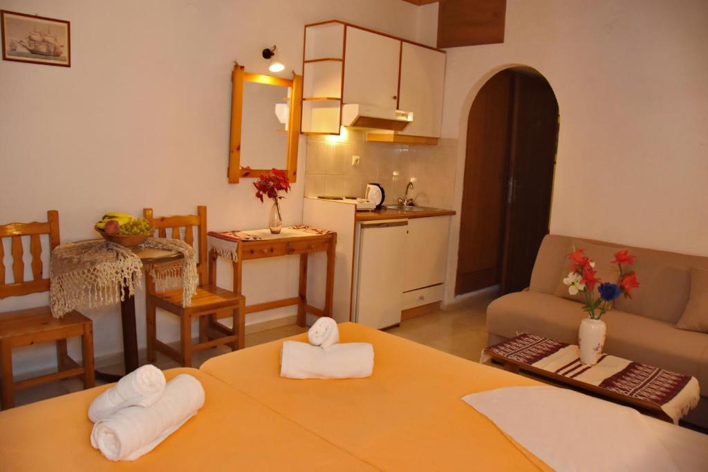 Postel nebo postele na pokoji v ubytování Hotel Anatoli Apartments