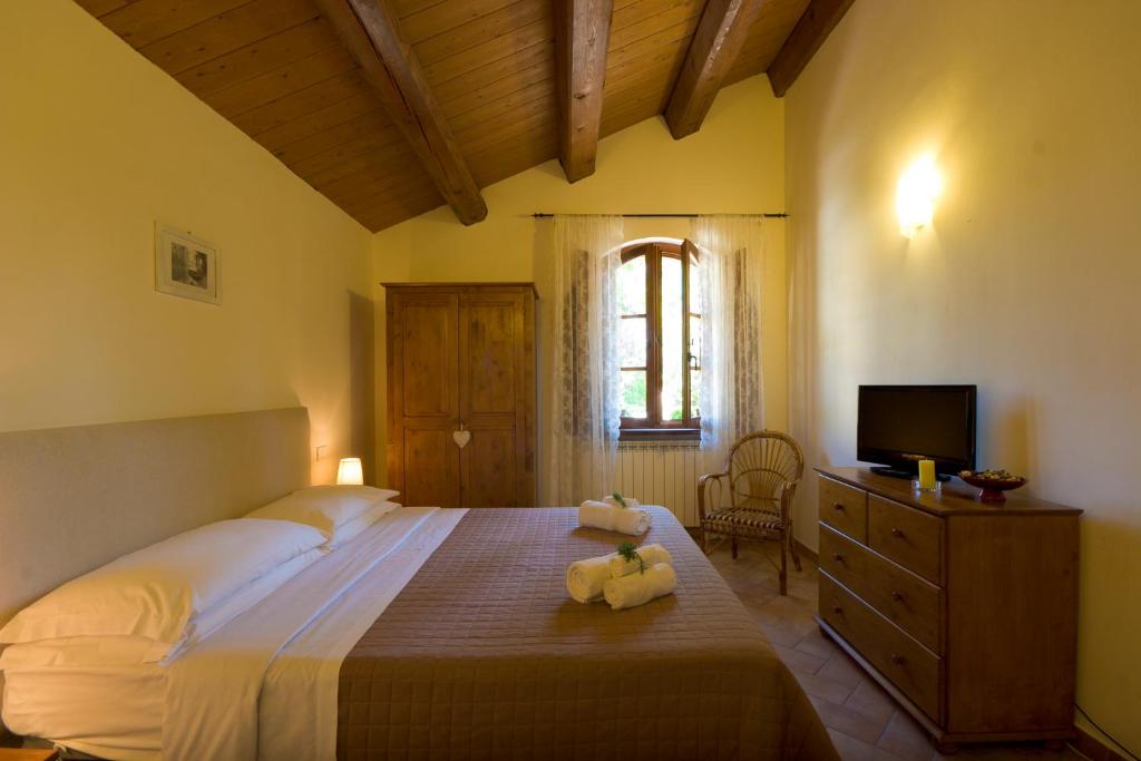Postel nebo postele na pokoji v ubytování B&B Cristina
