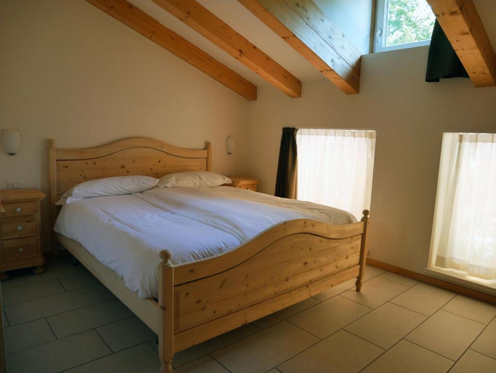 Postel nebo postele na pokoji v ubytování Hotel Elbele Garnì