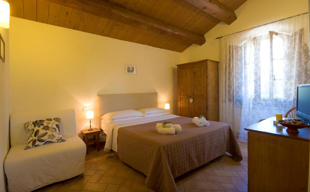 Postel nebo postele na pokoji v ubytování B&B Cristina