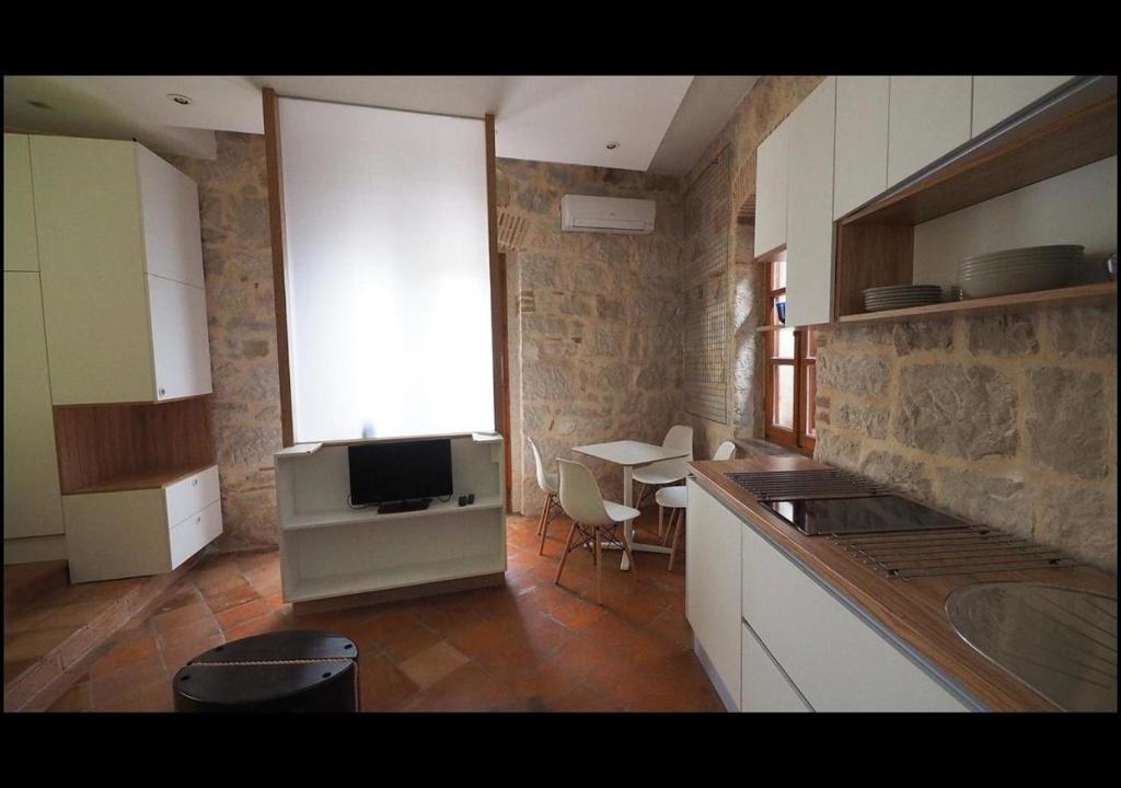 Køkken eller tekøkken på Sweet suite Kaštel Old town