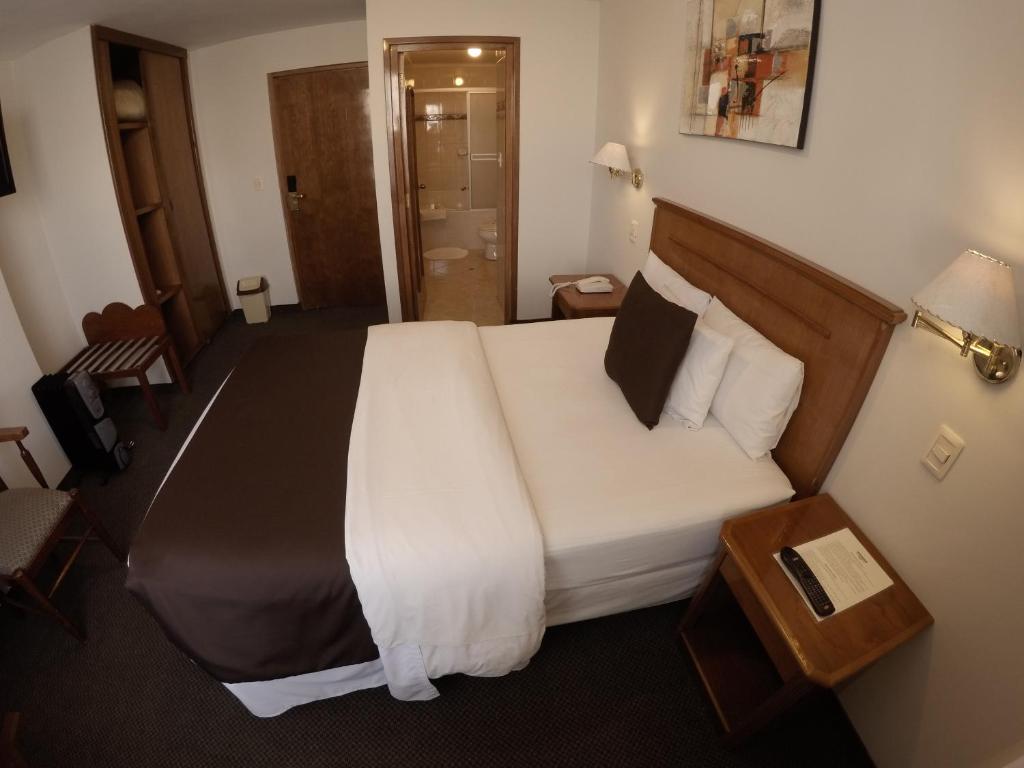 Cama o camas de una habitación en Casona Plaza Hotel Puno