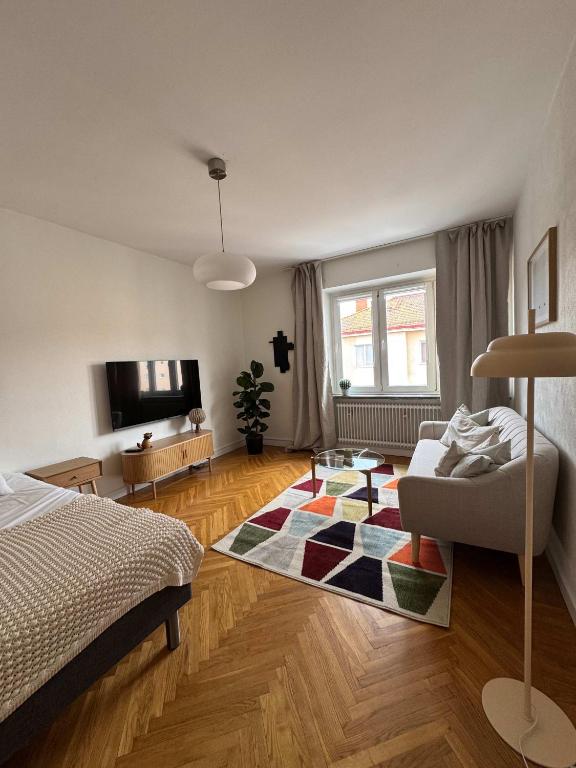 Ένα ή περισσότερα κρεβάτια σε δωμάτιο στο Easy living in suburban studio