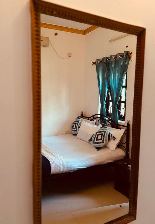 Postel nebo postele na pokoji v ubytování D Guest House