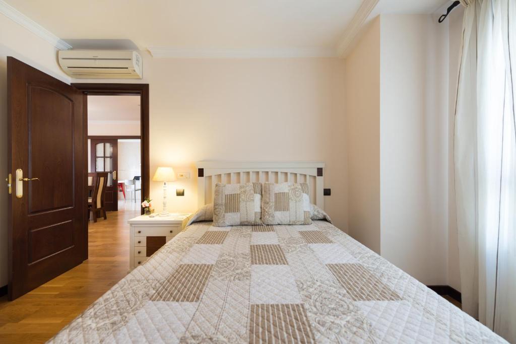 Postel nebo postele na pokoji v ubytování Apartamento Good Holidays