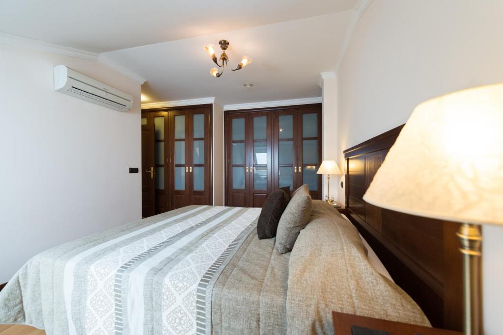Postel nebo postele na pokoji v ubytování Apartamento Good Holidays