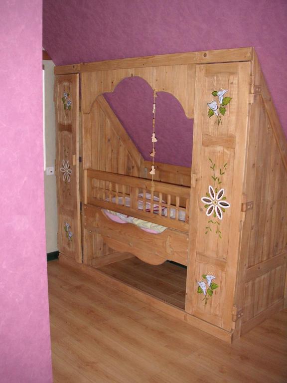 Postel nebo postele na pokoji v ubytování Gite Le Petit Moulin