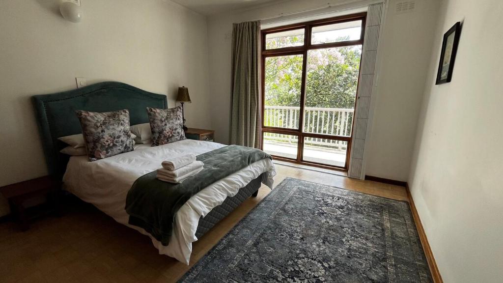 Katil atau katil-katil dalam bilik di Homey Central Apartment By ARPA