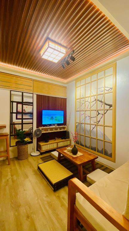 TV a/nebo společenská místnost v ubytování Okaeri Place - Messavirre Gardens Residences Bacolod