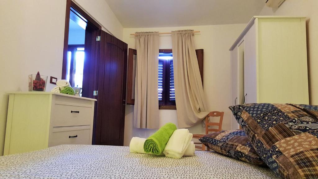 A bed or beds in a room at Dimora Storica San Giovanni