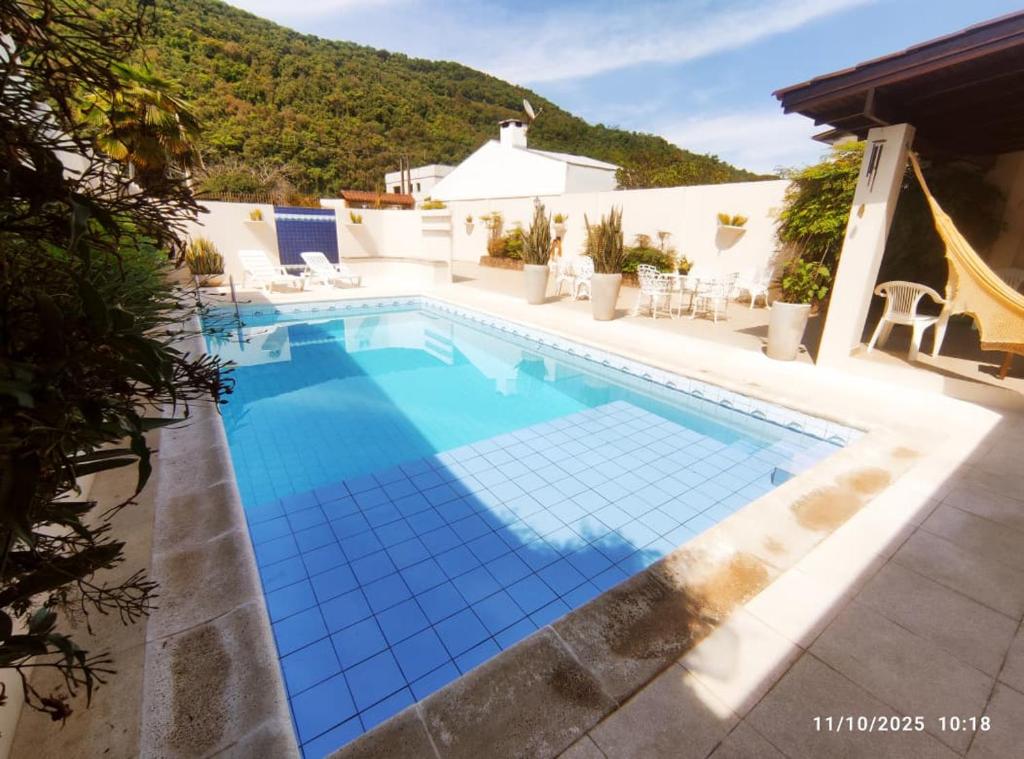Πισίνα στο ή κοντά στο Quiosque com piscina e churrasqueira!