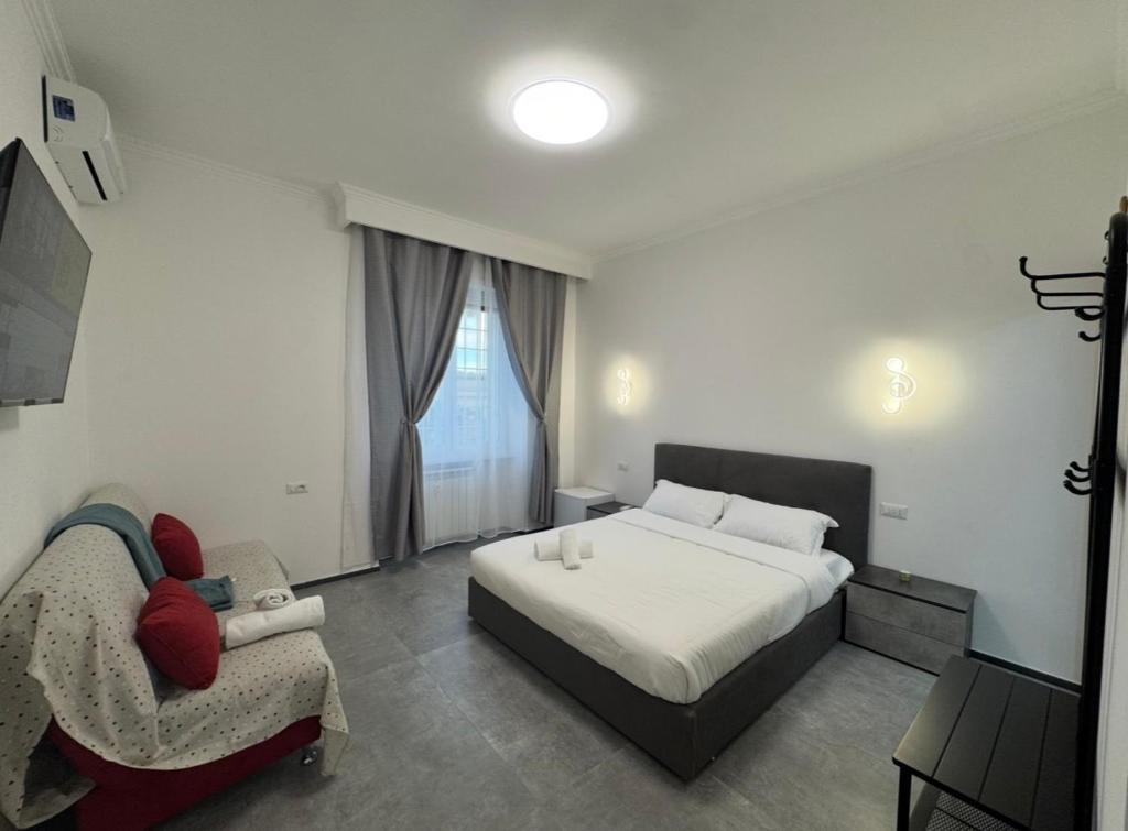 Ένα ή περισσότερα κρεβάτια σε δωμάτιο στο U Sweet Home