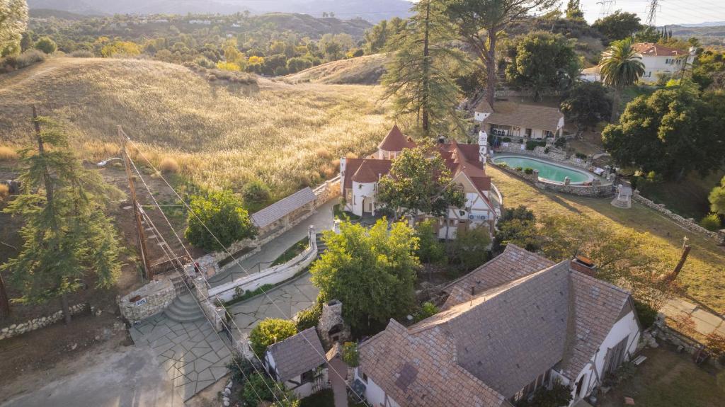 an aerial view of a house with a yard at Magic Castle Unit 7 in Santa Clarita