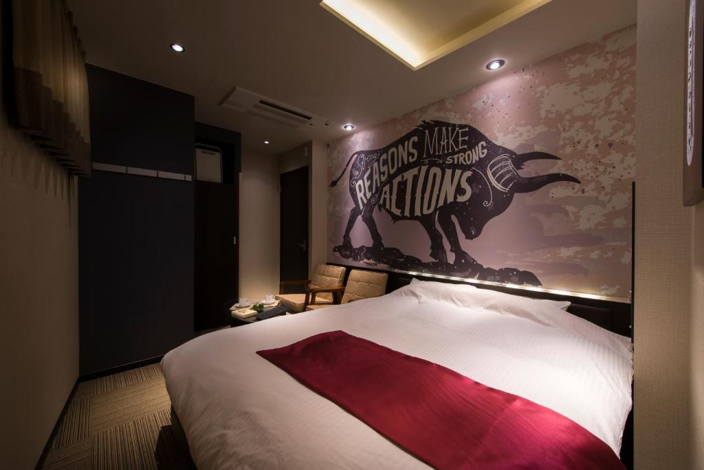 Postel nebo postele na pokoji v ubytování The CALM Hotel Tokyo
