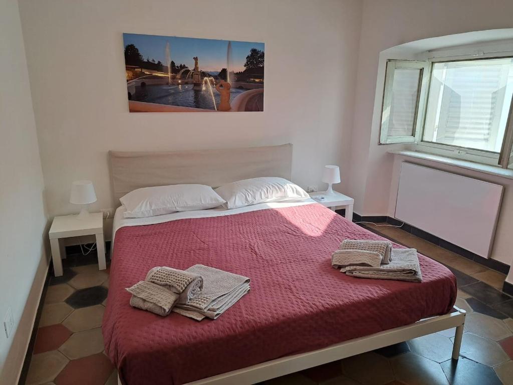 Ένα ή περισσότερα κρεβάτια σε δωμάτιο στο La petite maison royale