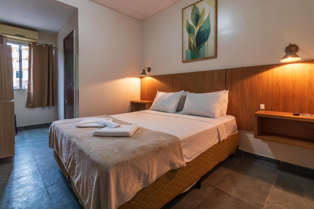 Katil atau katil-katil dalam bilik di Foz Central Budget Hotel