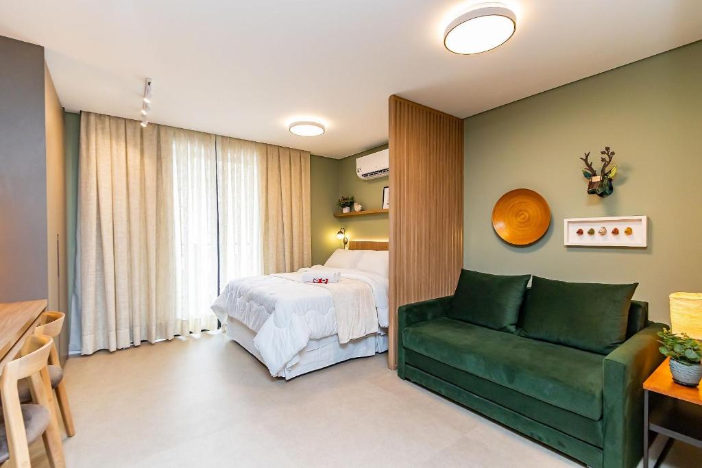 Ένα ή περισσότερα κρεβάτια σε δωμάτιο στο Studio Completo p/ 4 pessoas no All Batel -BAT1714