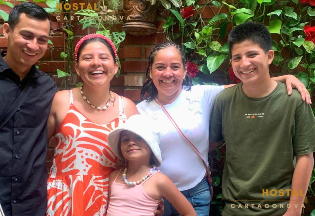 a group of people posing for a picture at Hostal Cartagonova - Habitaciones privadas y amplias cerca a zonas turísticas in Cartagena de Indias