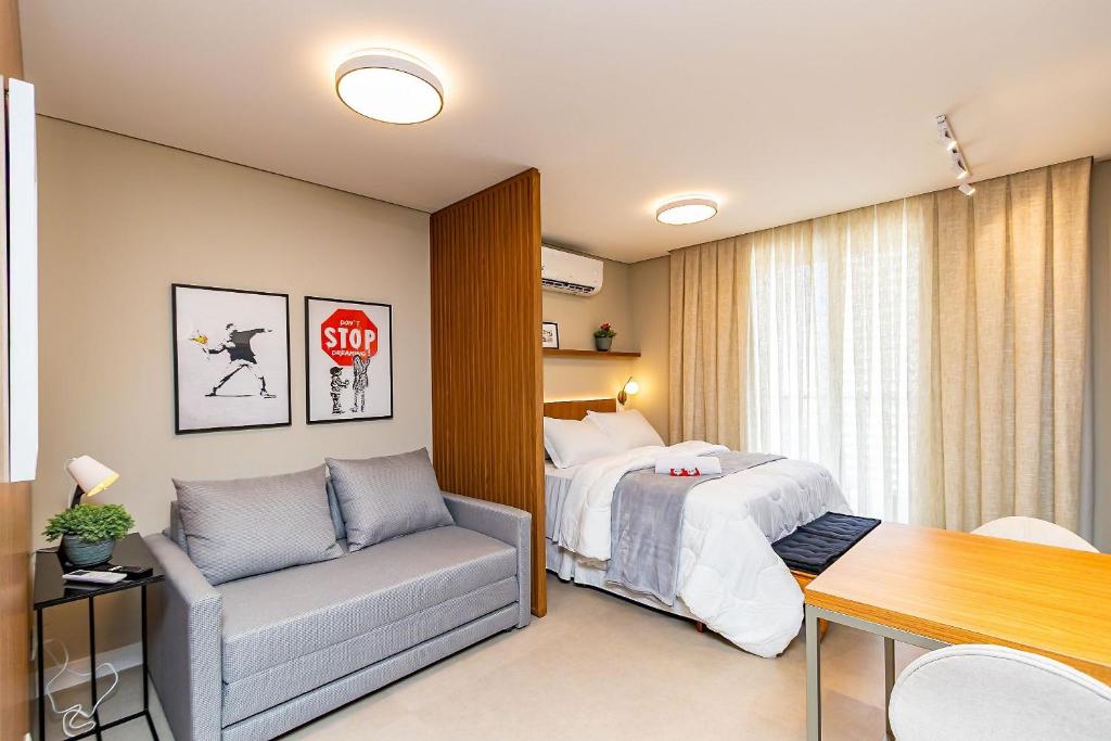 Ένα ή περισσότερα κρεβάτια σε δωμάτιο στο Studio Premium p/ 4 pessoas no All Batel - BAT1816