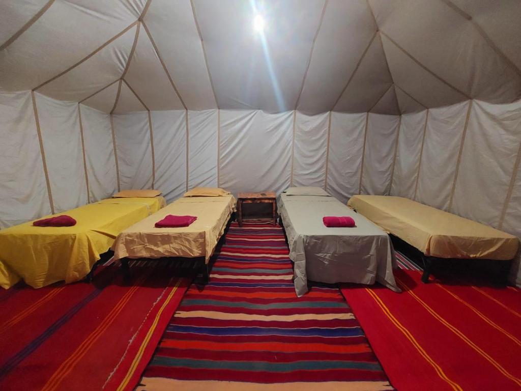 Postel nebo postele na pokoji v ubytování Dar chez ali