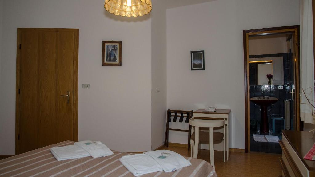 Postel nebo postele na pokoji v ubytování Stella d'Oro