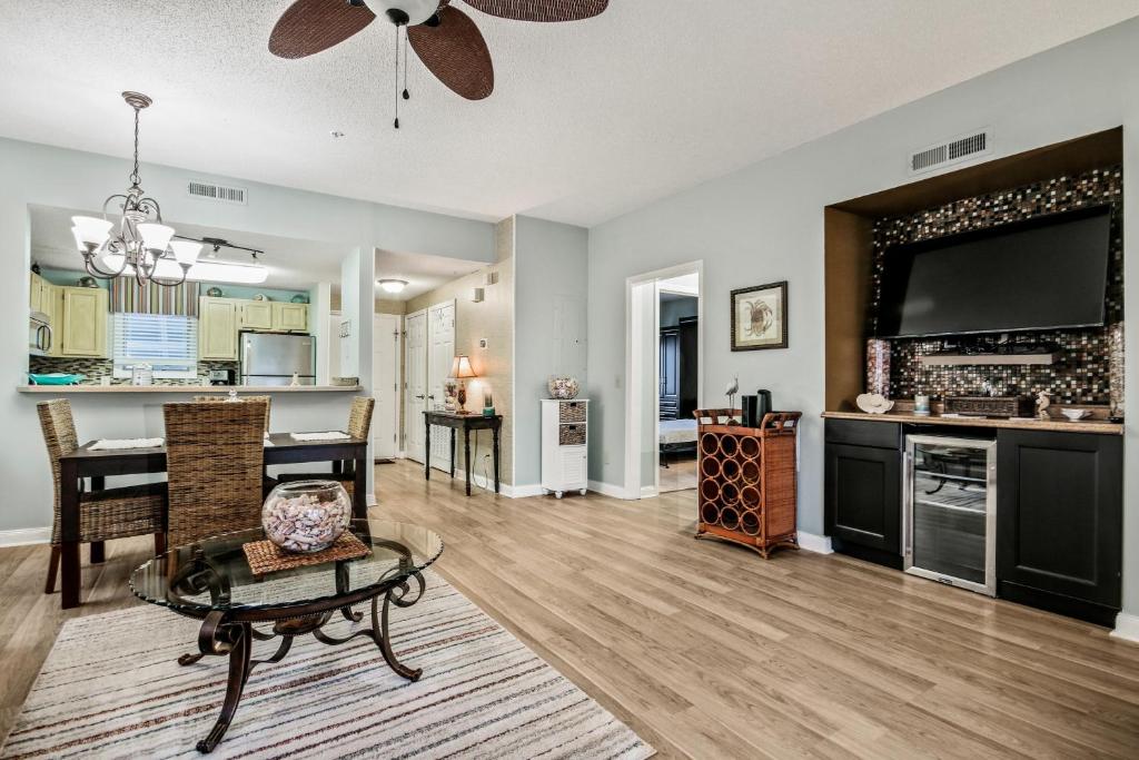 a living room with a kitchen and a dining room at Tidewater 1911 in The Old Home Place