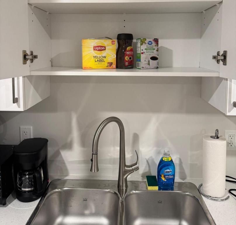 Η κουζίνα ή μικρή κουζίνα στο Comfy Apartment