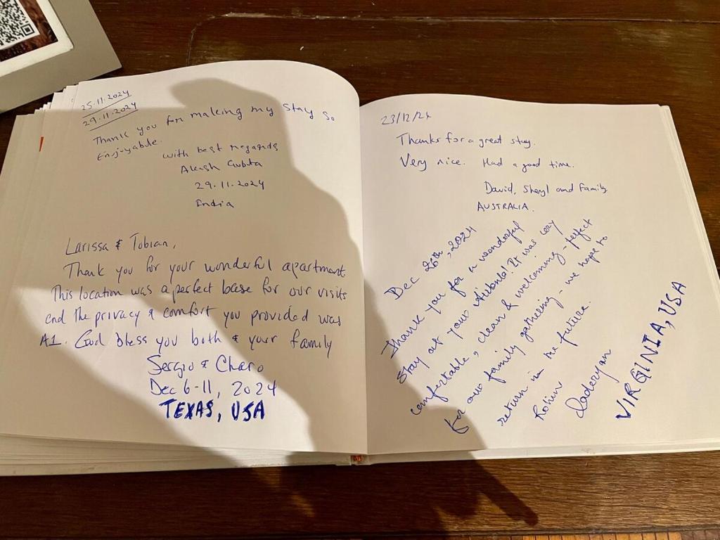 a book with a heart written on the pages at Moderne Wohnung nahe Hockenheimring für bis zu 8 Personen in Hockenheim