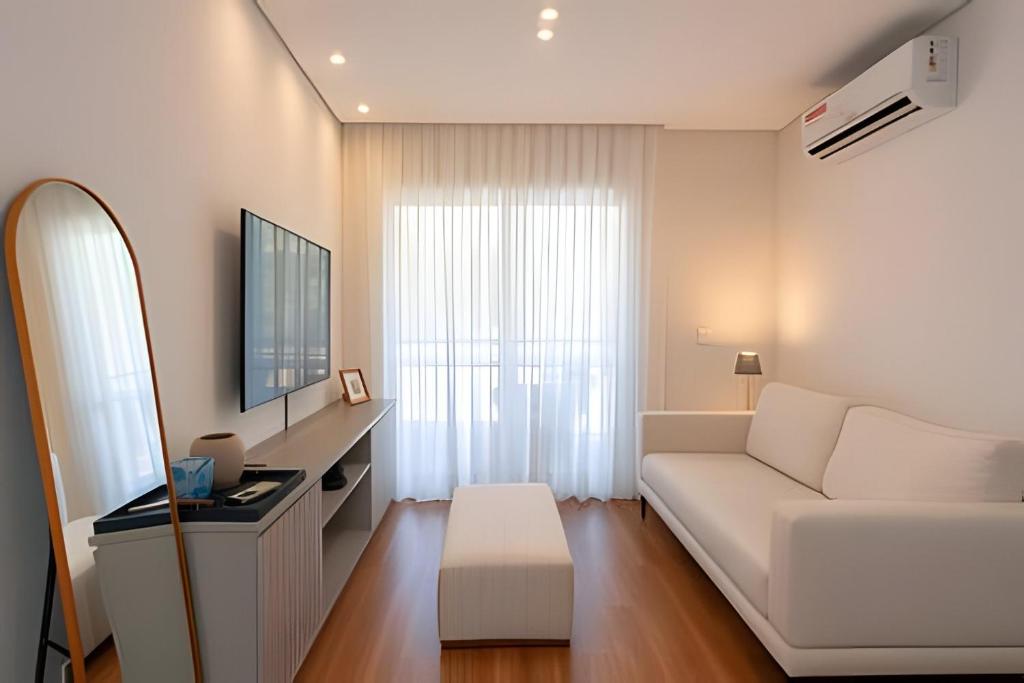 Телевизор и/или развлекательный центр в A6/404-Cobertura Duplex ao lado MorumBIS Einstein com Jacuzzi