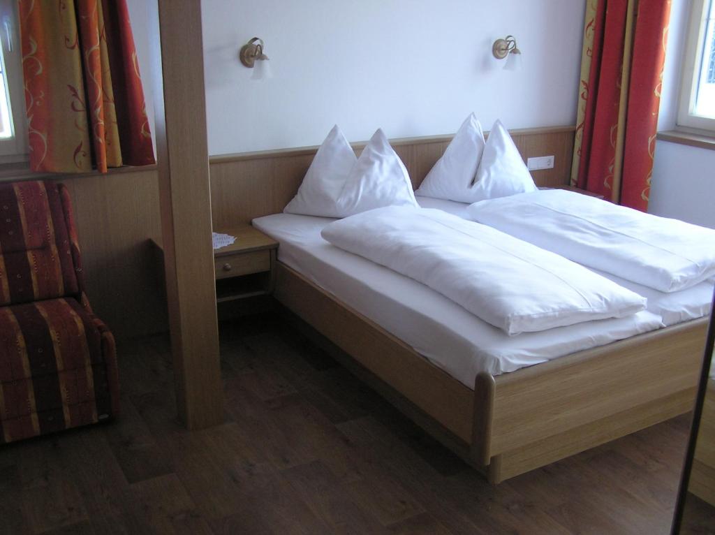 Postel nebo postele na pokoji v ubytování Appartements Luegeck
