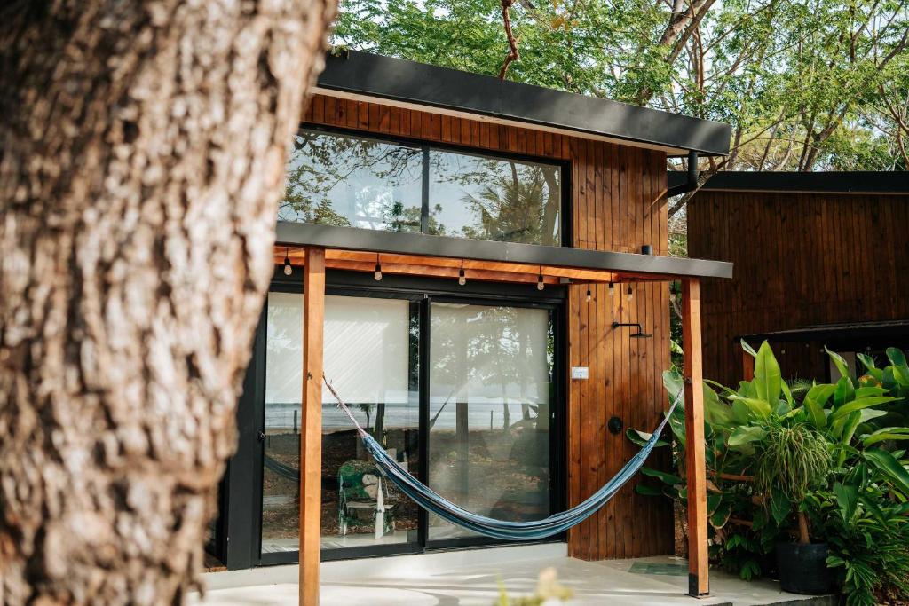 a house with a hose on the side of it at Soul - Oceanfront Jungle Loft in Playa Venao