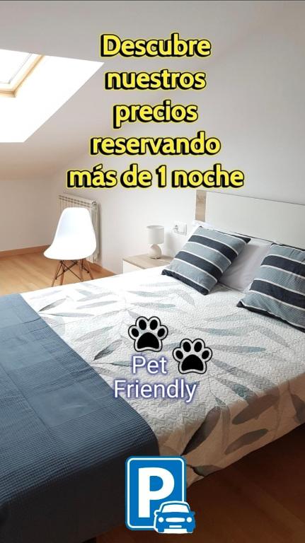 a bedroom with a bed with words on it at Secretos de Teruel VUT-TE-24-0075 in Teruel