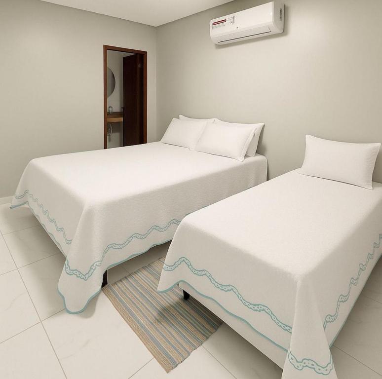 Ένα ή περισσότερα κρεβάτια σε δωμάτιο στο Brisamar