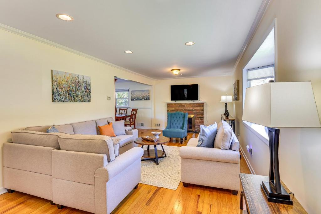 a living room with a couch and chairs at Spacious Fanwood Home with Decks, Walk to Park! in Plainfield