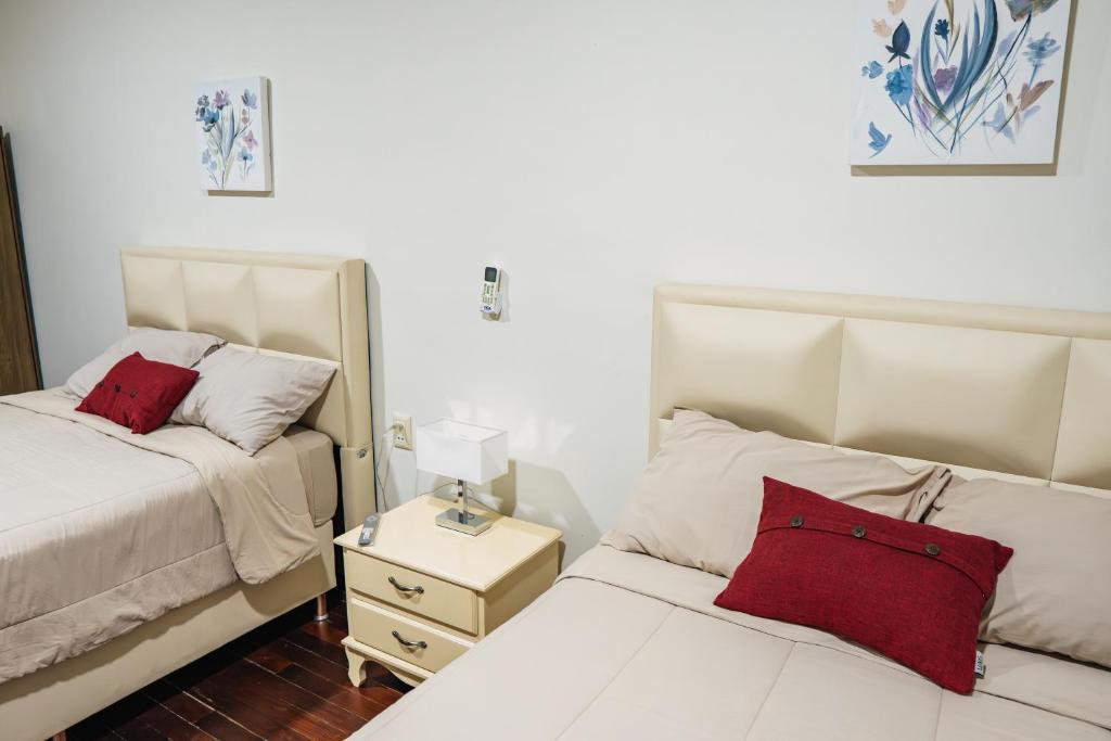 Postel nebo postele na pokoji v ubytování Hotel Boutique La Casona