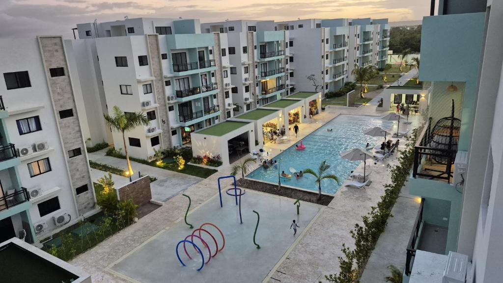 an aerial view of an apartment complex with a swimming pool at Epic Sun in Punta Cana
