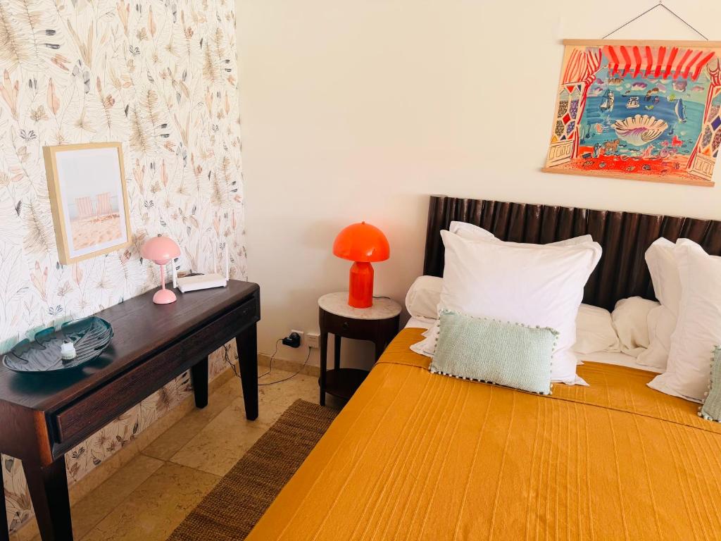 Katil atau katil-katil dalam bilik di New Mont Vernon chic relax sur plage et piscine