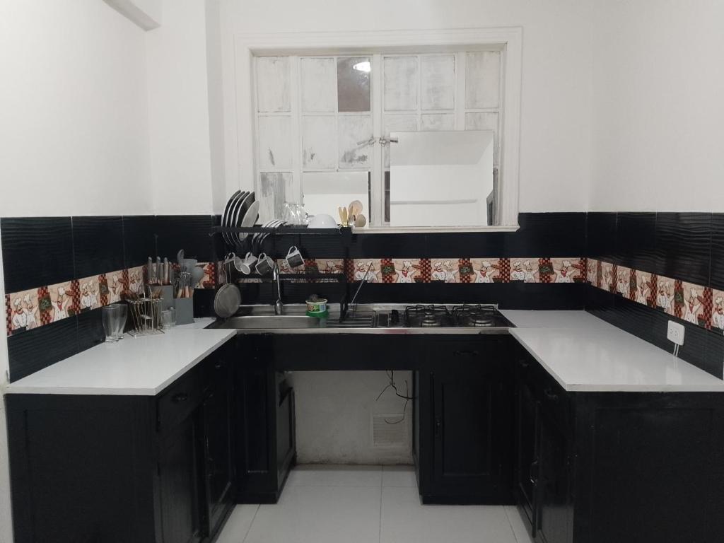 Kuchyň nebo kuchyňský kout v ubytování Centro histórico Candelaria Antigua