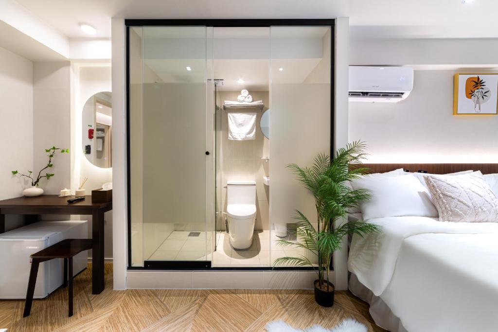 Ένα ή περισσότερα κρεβάτια σε δωμάτιο στο Haven Stay Jongno