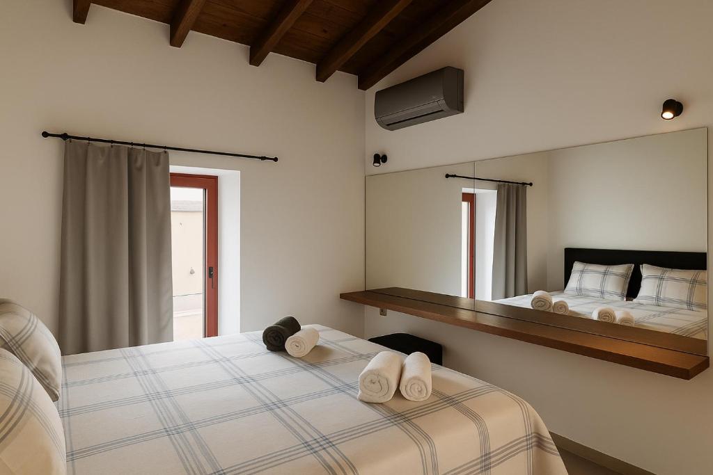 Ένα ή περισσότερα κρεβάτια σε δωμάτιο στο Evanthia maisonette