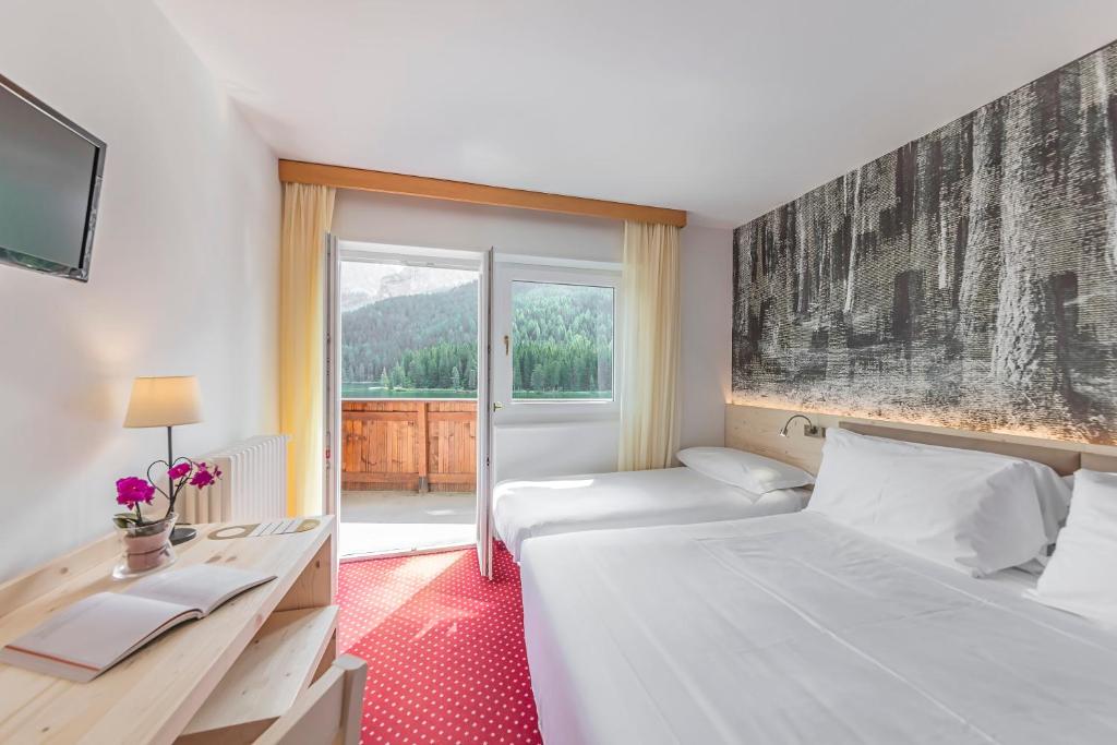 Cama o camas de una habitación en Hotel Sorapiss