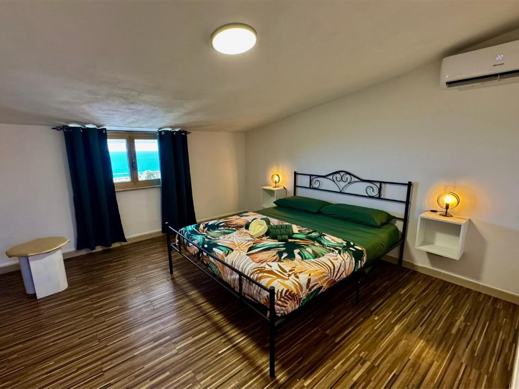 Ένα ή περισσότερα κρεβάτια σε δωμάτιο στο Residenza De Vita