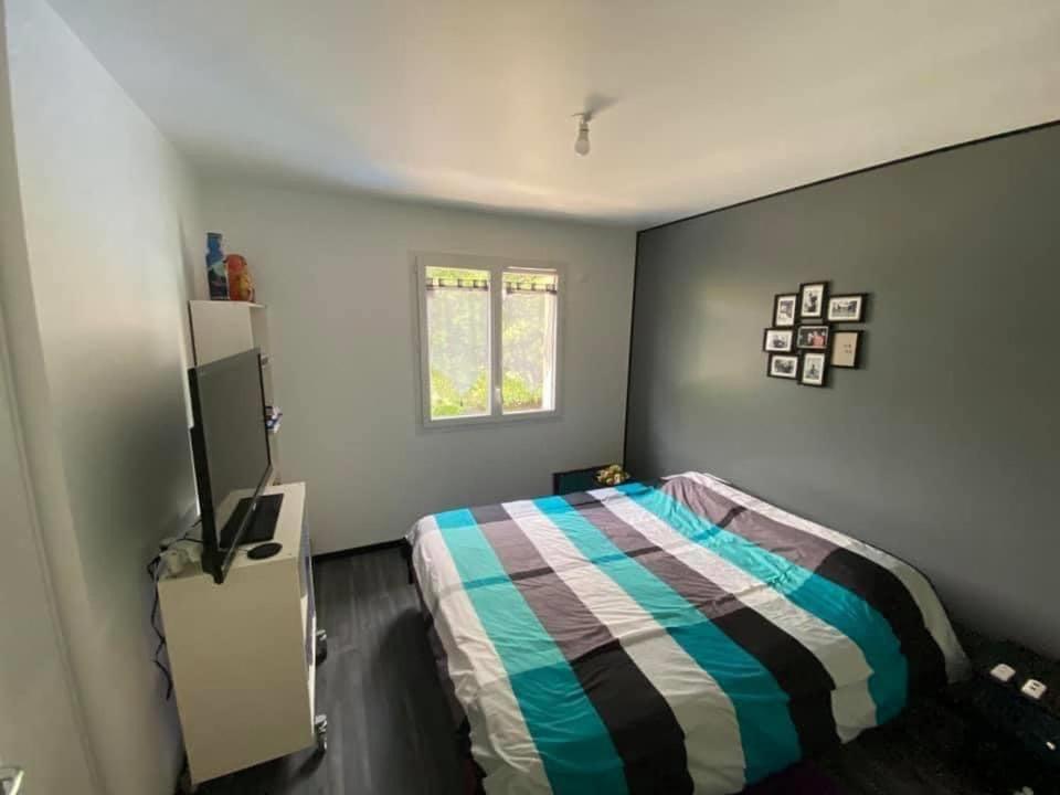 Ένα ή περισσότερα κρεβάτια σε δωμάτιο στο Cosy Lodge