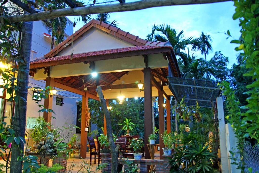 Village Love Homestay - テラス付きの四重群