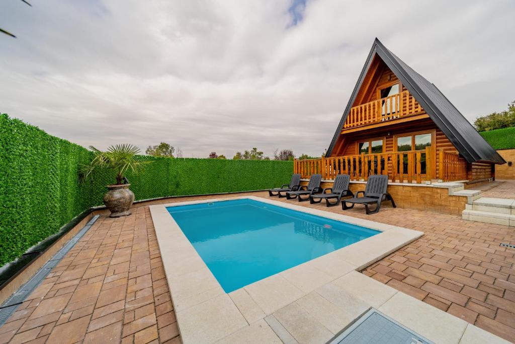 Bazén v ubytování Nektarija Pool House nebo v jeho okolí